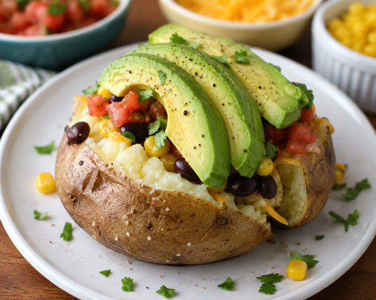 Baked potato with avocado