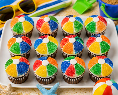 Decorated beach ball cupcakes