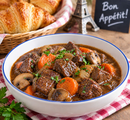 Kid-friendly Beef Bourguignon served with croissants