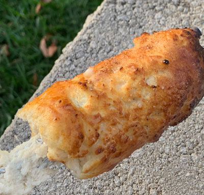 cooked donut on stick