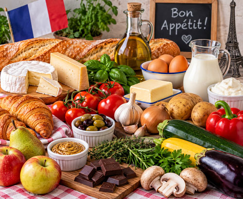 French ingredients including bread cheese butter herbs vegetables and chocolate