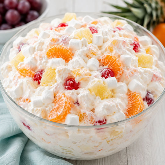 Fruit in a Cloud creamy dessert salad with fruit marshmallows and whipped topping