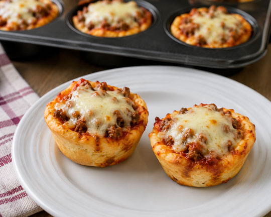 Pizza snack cups baked with sauce cheese and toppings