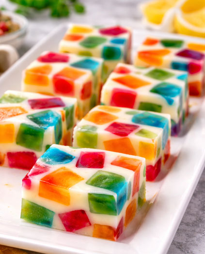 rainbow jello dessert with creamy layer