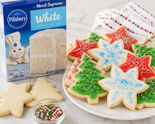 Rolling sugar cookie dough for Christmas cookies