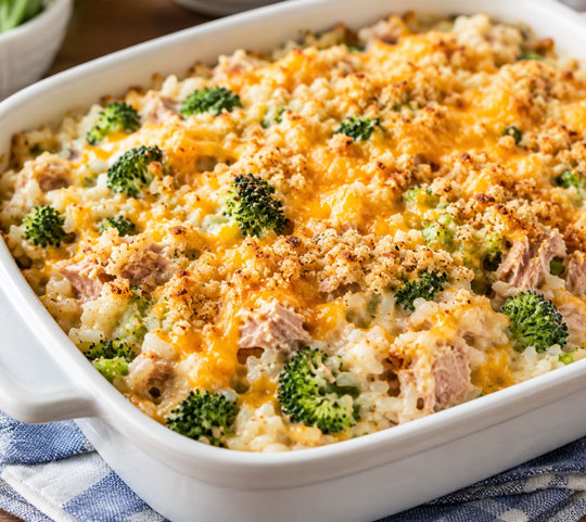 Creamy tuna broccoli rice casserole topped with melted cheese and crispy breadcrumbs