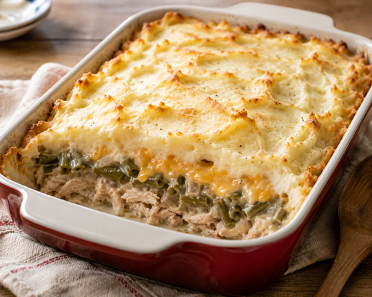 Turkey potato casserole topped with creamy mashed potatoes
