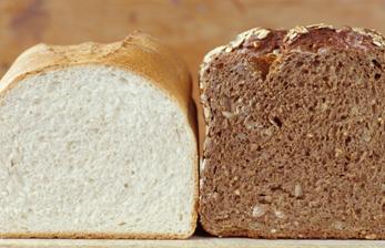 loaf of white and wheat bread