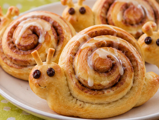 Cinnamon roll snails made from spiral rolls