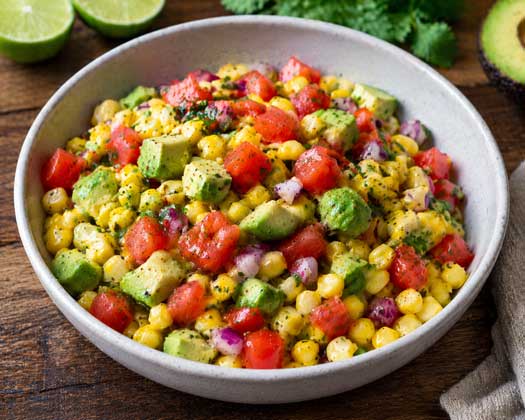 Corn and tomato side dish with avocado