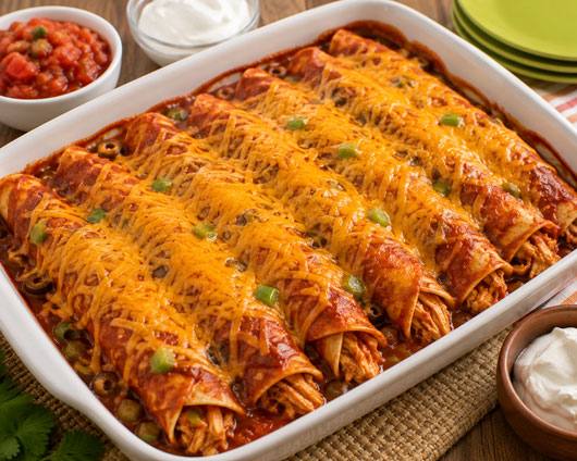 Chicken enchiladas with red enchilada sauce