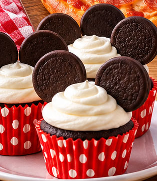 Chocolate cupcakes with round cookie ears for a Mickey Mouse inspired movie night