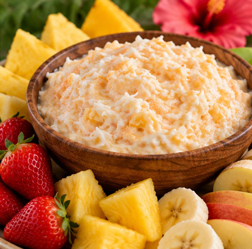Pineapple coconut fruit dip served with fresh fruit