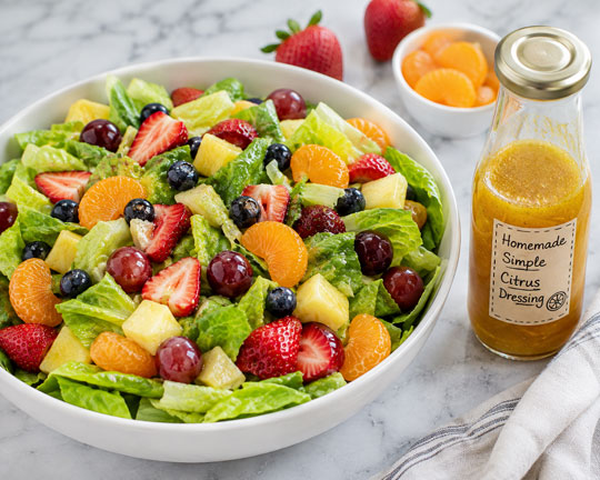 Romaine fruit salad with apples, grapes, oranges and pecans