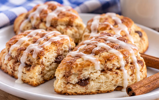 Homemade cinnamon scones served with fresh strawberries