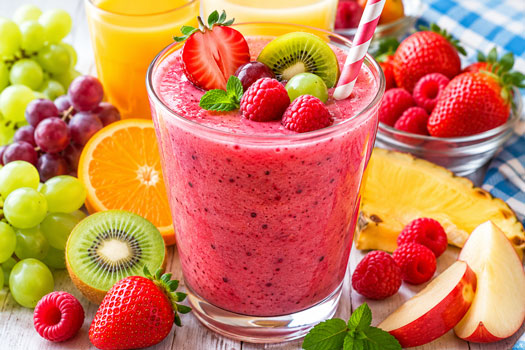 Fruit juice smoothie made with berries, grapes, kiwi, and fruit juices