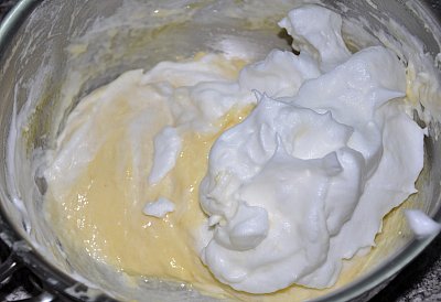 Folding egg whites into cheese souffle mixture