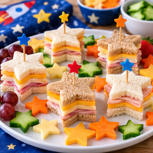 Star-shaped cheese and sandwich appetizers for a space party