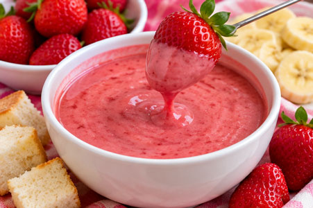strawberry fondue with cake and fruit dippers