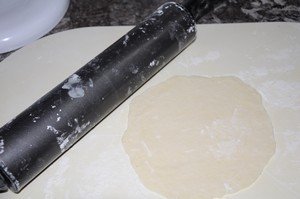 rolling homemade tortillas