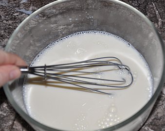 stirring in warmed milk