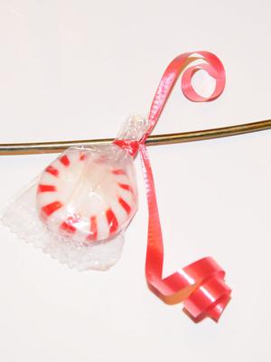 Tie candy onto wreath with ribbon