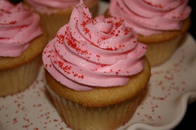  Delicious Corn Muffin with Pink Frosting and Red Crystal Sprinkles 