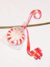 Tie candy onto wreath with ribbon