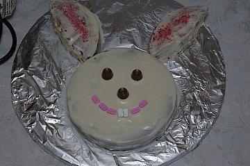 Make a bunny cake out of 2 round cake pans