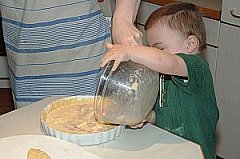 toddler pouring